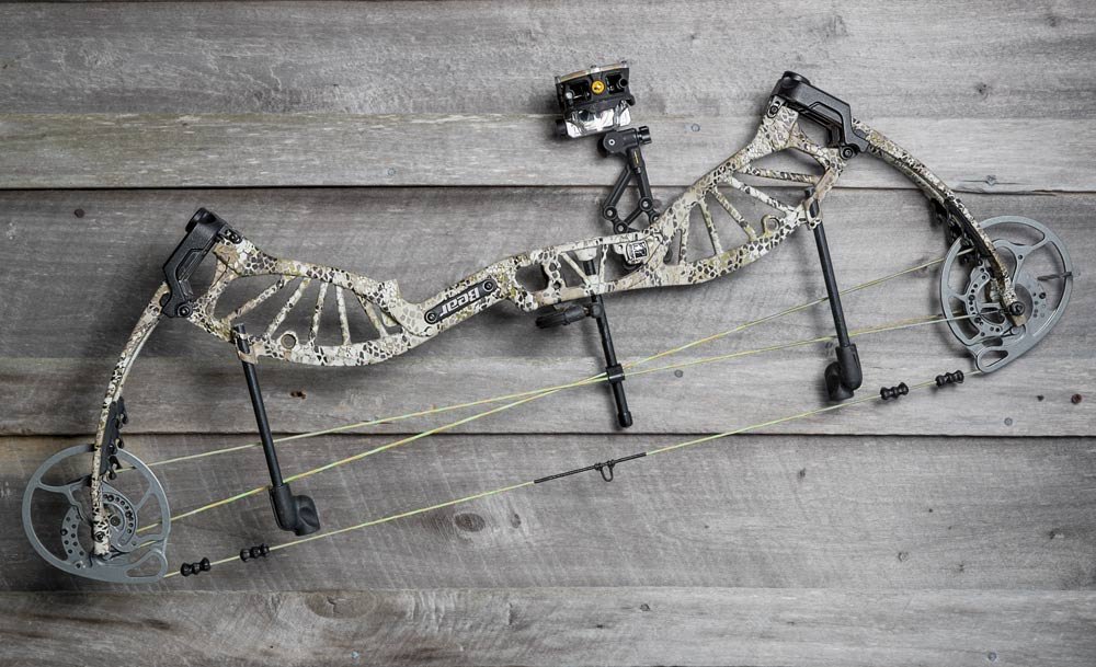 compound bow on wooden table